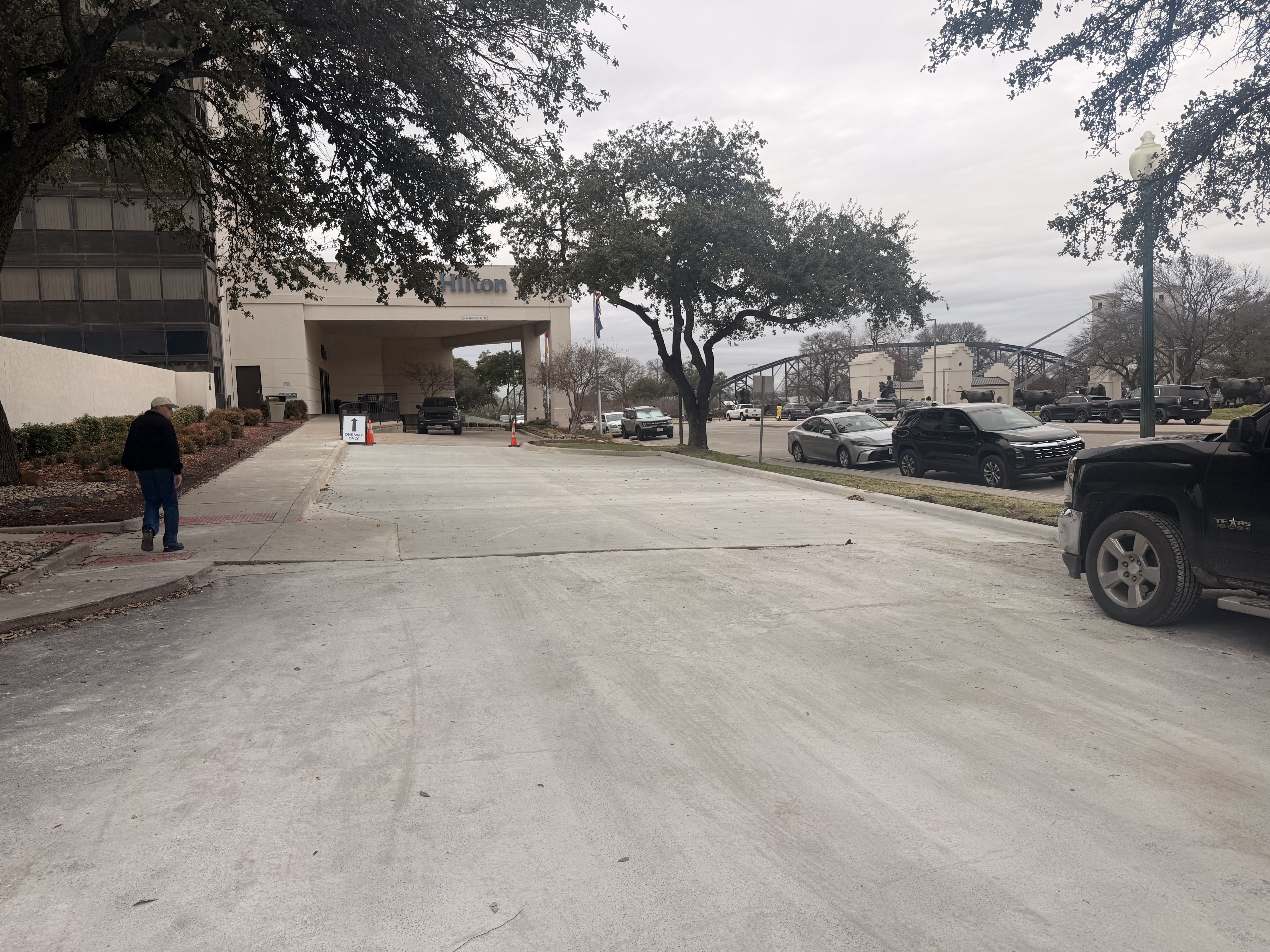 Completed commercial concrete driveway at a hotel property by APC