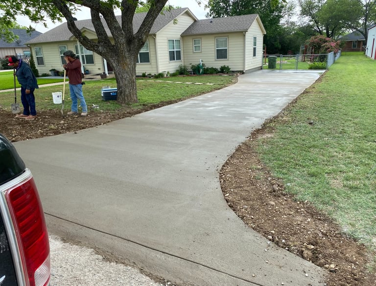 Residential concrete driveway installed by APC in Central Texas
